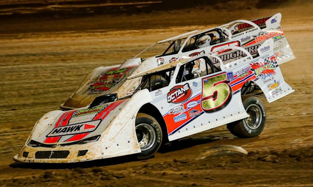 Dirt track racing with dual rate suspension springs
